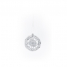 A delicate, shimmering silver ornament with intricate lace-like details, suspended in white space.