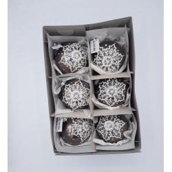 Six round, brown ornaments with white snowflake designs, nestled in a gray box.