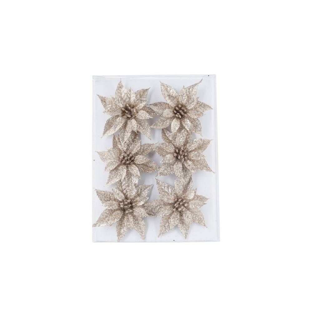 Six shimmering gold flowers with pointed petals arranged on a clear background.