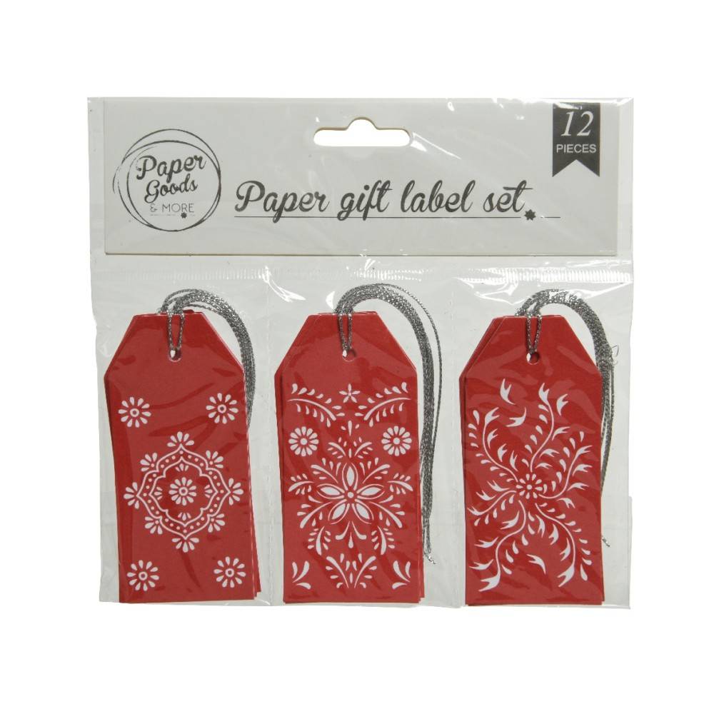A set of twelve red paper gift labels featuring intricate white floral designs.