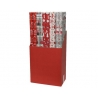 A red box filled with colorful holiday-themed wrapping paper rolls.