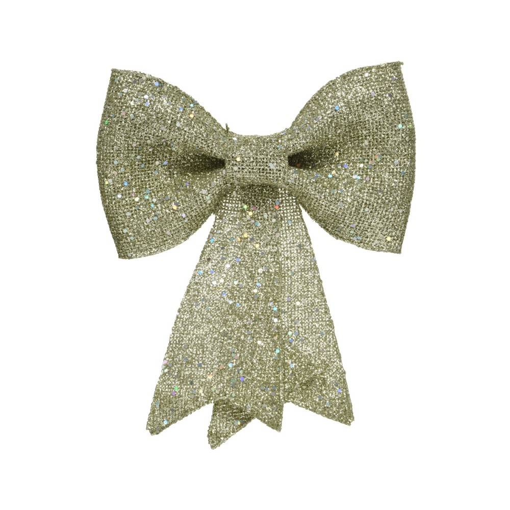 A shimmering gold bow with a textured fabric and trailing ribbon ends.