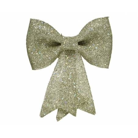 A shimmering gold bow with a textured fabric and trailing ribbon ends.