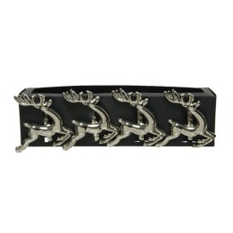 Vier metalen herten met hoorns op een zwarte wandplank, modern en decoratief.