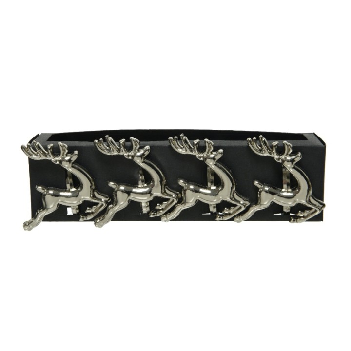 Vier metalen herten met hoorns op een zwarte wandplank, modern en decoratief.