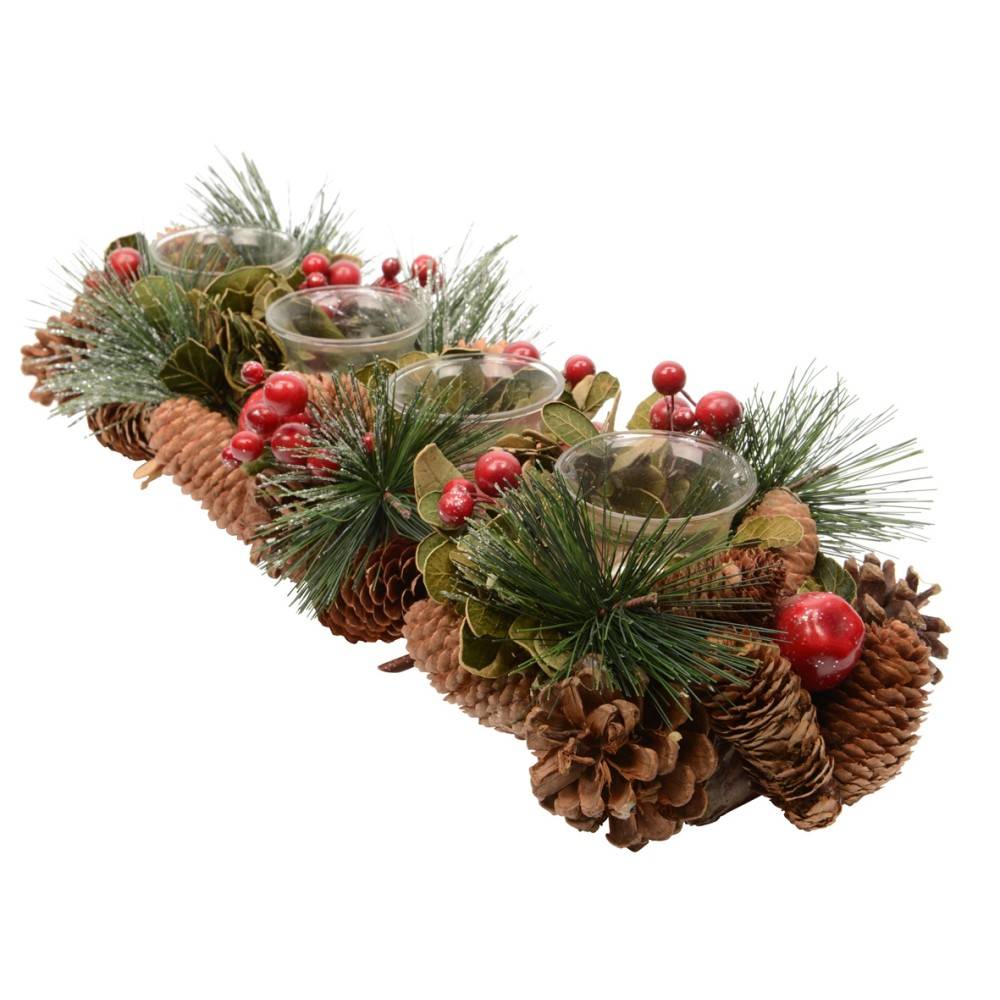A festive centerpiece with pinecones, greenery, berries, and candle holders.