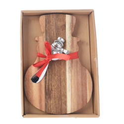 A wooden cutting board shaped like a snowman, adorned with a silver spoon and red ribbon.