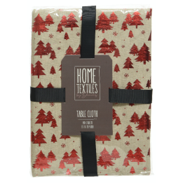 A beige tablecloth featuring shiny red trees, wrapped in a black ribbon.