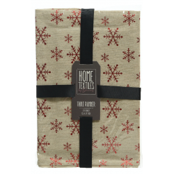 A beige table runner adorned with red snowflakes, neatly packaged with a black ribbon.