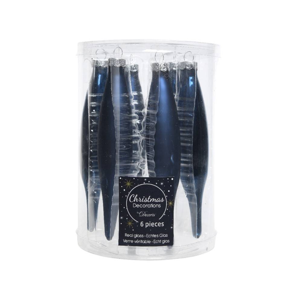 A clear cylindrical container holds six elegant, shiny glass ornaments in blue and silver hues.