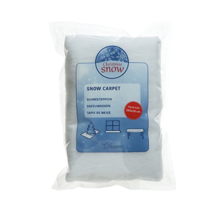Witte, zachte decoratieve sneeuwtapijt in plastic verpakking, ideaal voor kerstversiering.