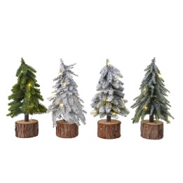 Miniatuur kerstbomen in groen en wit, met lichtjes, op houten schijven als basis.