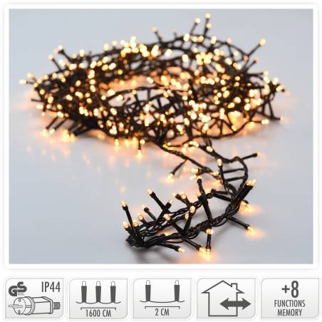 A tangled string of warm white fairy lights on a dark wire, creating a cozy glow.