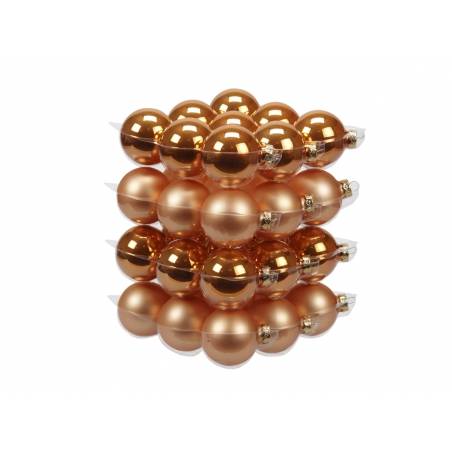 A stack of shiny and matte copper-colored Christmas ornaments.