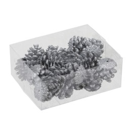 Glitterschitterende dennenappels in een doorzichtige doos, een feestelijke en decoratieve uitstra...