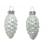 Two glass pinecone ornaments, shimmering silver with textured surfaces, reflecting light.