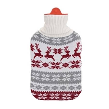 A cozy hot water bottle with a festive knit cover featuring red reindeer and snowflakes.