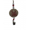 A round, festive ornament with "Merry Christmas," red and white beads, and a silver bell.