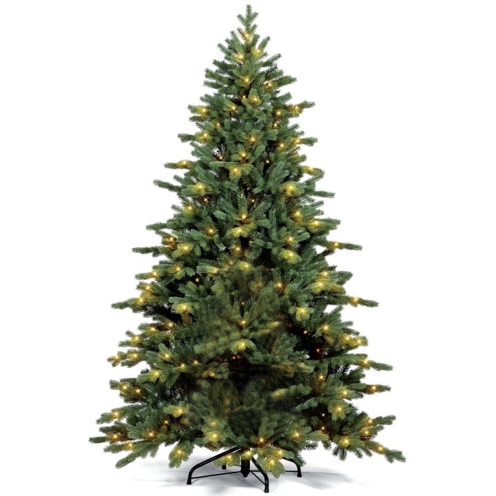 Groene kunstkerstboom met zachte takken en warme, twinkelende lichtjes.