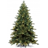 A lush green artificial Christmas tree adorned with warm white lights.