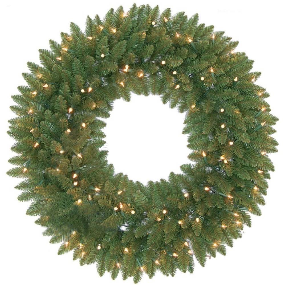 A lush green wreath adorned with twinkling white lights, creating a festive ambiance.