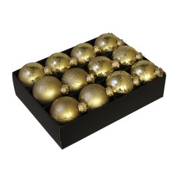 Gouden kerstballen in een zwarte doos, met glanzende en matte afwerkingen.