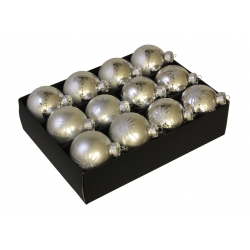 A box of shiny silver ornaments, each adorned with delicate snowflake patterns.