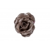 A shimmering brown rose adorned with glitter, petals elegantly layered.