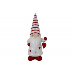 A whimsical gnome in red and white stripes, holding a heart-shaped ornament.