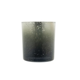 Een glazen kaarsenhouder met een ombre-effect van grijs naar zwart, versierd met subtiele glitter.
