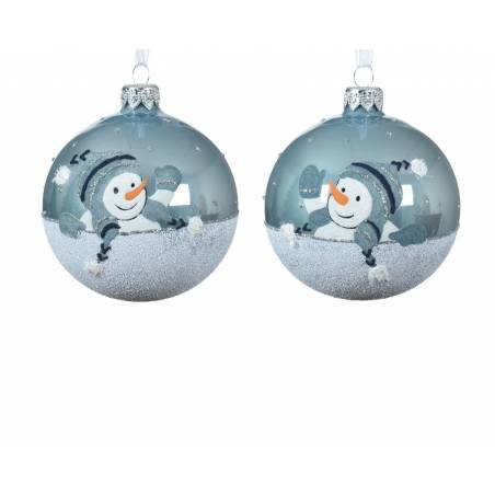 Two round glass ornaments featuring a cheerful snowman in a winter scene, adorned with snowflakes.