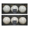 Six decorative Christmas ornaments in white with gold accents and intricate patterns.