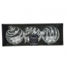 Three elegant, white Christmas ornaments with silver swirls in a sleek black box.