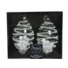 Two decorative Christmas ornaments, shaped like pine cones, adorned with white beads and fluffy p...
