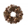 A warm, earthy wreath of pinecones, golden baubles, and delicate greenery.