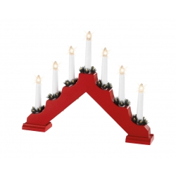 A red wooden candle holder in a wave shape, adorned with green accents and six white candles.