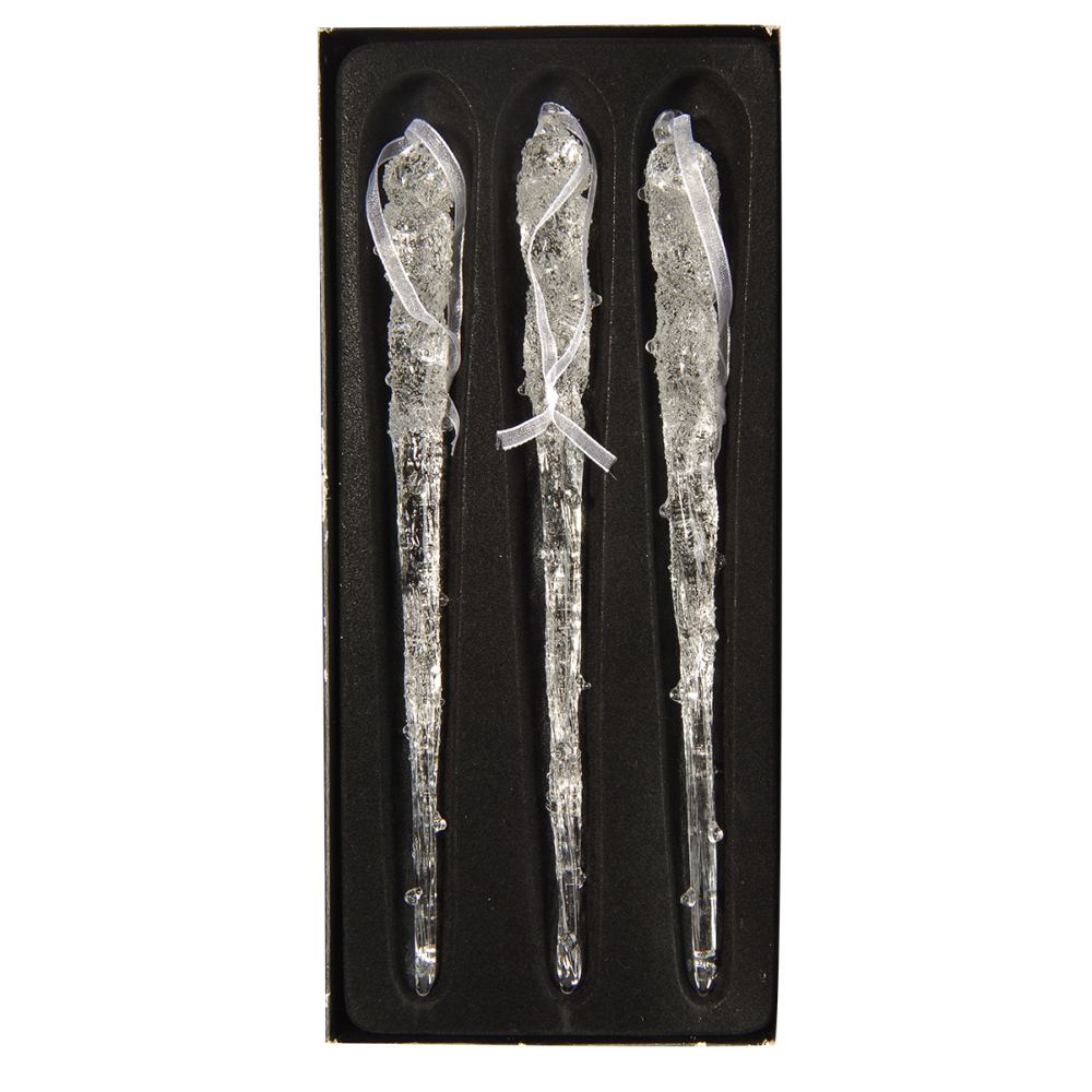 Three elongated, transparent glass icicles with a textured surface, set against a black background.
