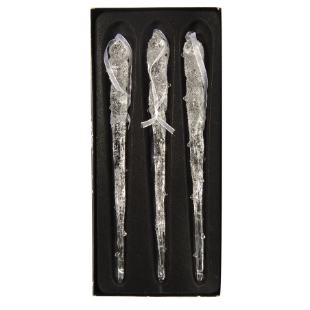Three elongated, transparent glass icicles with a textured surface, set against a black background.