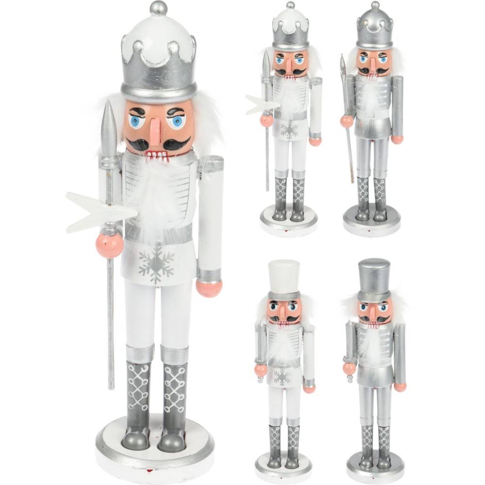 A collection of silver and white nutcracker figurines with distinct regal outfits and expressions.