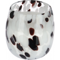 A translucent glass vessel with a speckled pattern of black and white dots.