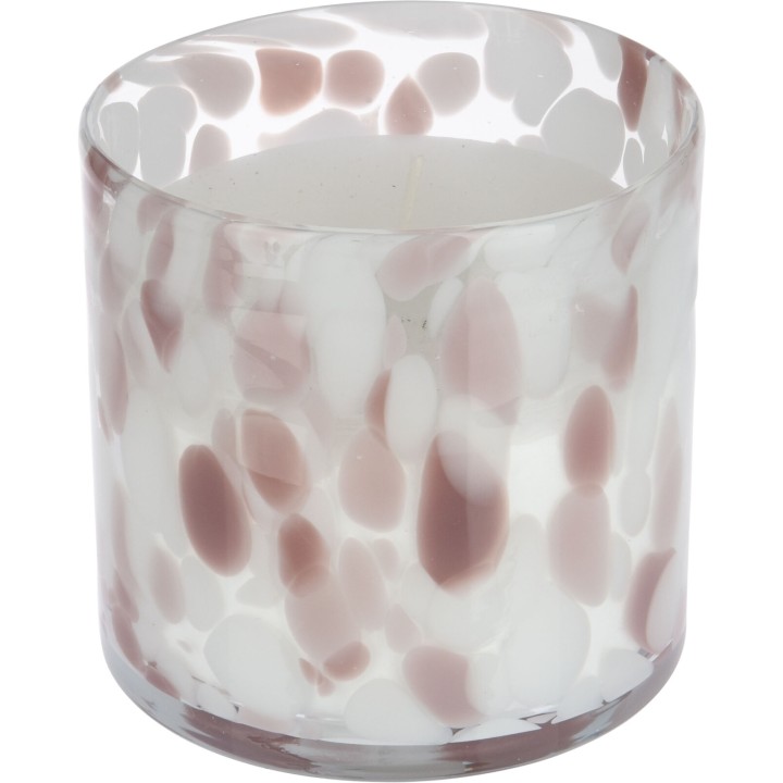A round candle in a translucent glass holder with soft pink and white speckled patterns.