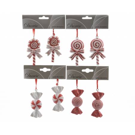 Colorful candy-themed ornaments in red and white, featuring swirls and bows.