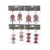 Colorful candy-themed ornaments in red and white, featuring swirls and bows.