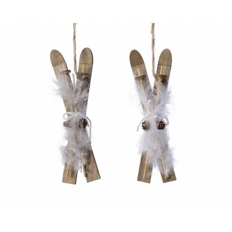 Two wooden skis tied with twine, adorned with white feathers and small pinecones.