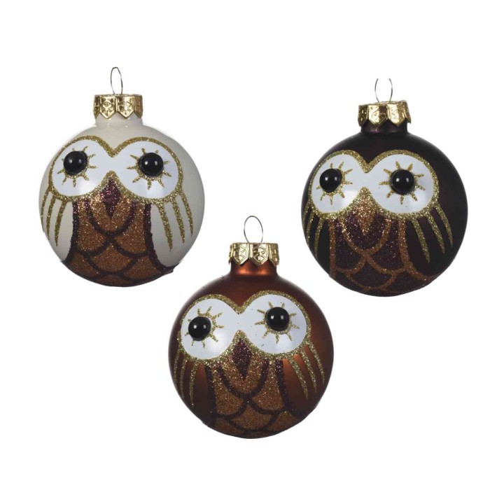 Drie kerstballen in de vorm van uilen, versierd met glitters en grote ogen, in diverse kleuren.