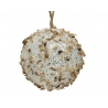 A glittery, white ball adorned with brown flakes and a twine loop for hanging.