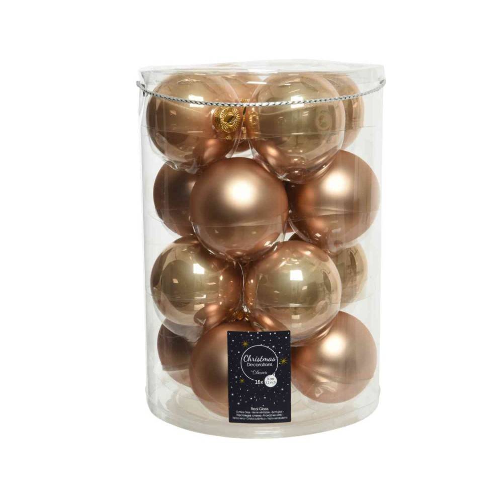 Een doorzichtige container met glanzende gouden en bronzen kerstballen.