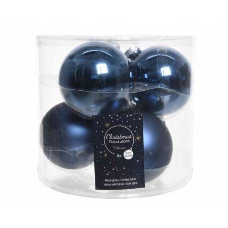 A clear container holding six shiny dark blue Christmas ornaments.