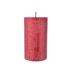 A tall, cylindrical candle in a vibrant red hue with a textured surface.