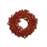 A circular wreath made of vibrant red berries, giving a festive, natural look.